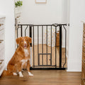 Carlson 29–36.5" Extra Wide Walk-Thru Dog Gate with Small Pet Door, Black